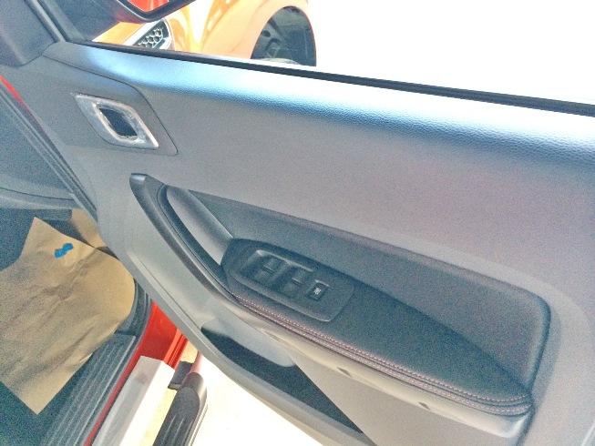 Orange Ford Ranger Wildtrak Interior Front door controls