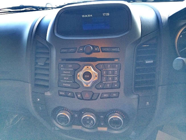 Orange Ford Ranger Wildtrak Interior instrument cluster with DVD player